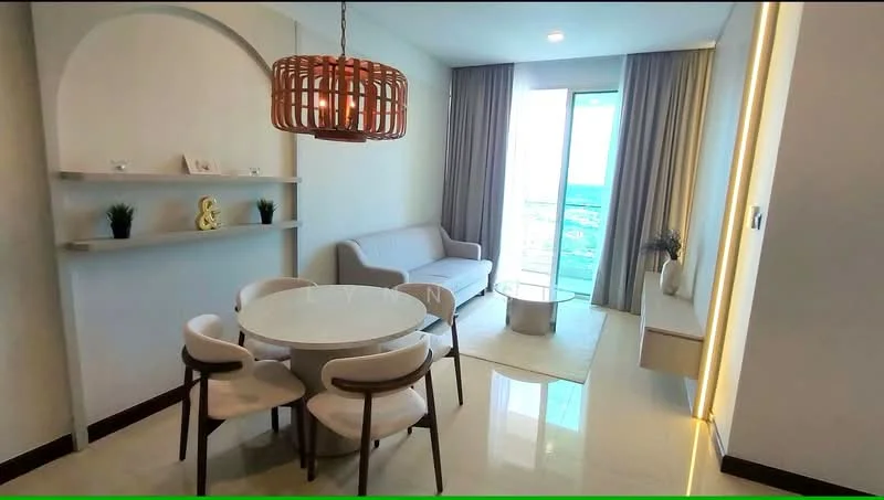 Dining features: round dining table, 4 upholstered dining chairs, 3-seater fabric sofa in light grey, shelf with decorative items, floor-to-ceiling windows, curtains, light fixture with woven design, polished tile flooring, neutral wall color, decorative plant on shelf, decorative vase on table; style: modern; view: city.