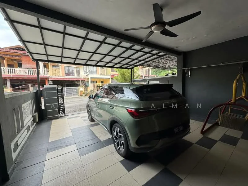 Exterior type: car porch; features: covered car porch, grey tiled flooring, black and white patterned tiles, ceiling fan, open space, street view, adjacent to residential buildings; style: modern.