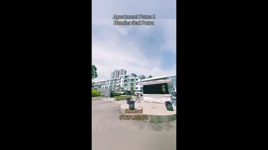 Exterior type: low-rise apartment block; features: white painted facade, glass windows, landscaped garden, manicured lawn, paved walkway, multiple storeys, balconies, surrounded by greenery; style: modern.