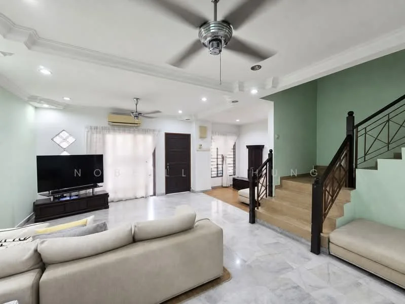 Living features: marble tile flooring, light green painted walls, white ceiling with crown moulding, 5-blade ceiling fan with light, wall-mounted TV, sofa in light grey fabric, coffee table, sheer curtains, sliding glass door, staircase with metal railing, decorative wall panel, air conditioning unit; style: modern.