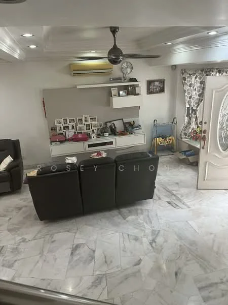 Living features: marble tile flooring, white painted walls, tray ceiling with recessed lighting, 5-blade ceiling fan, wall-mounted TV, TV console with storage, decorative wall frames, curtains with floral pattern, large entrance door with glass panel, sofa in dark color, open shelving unit; style: modern.