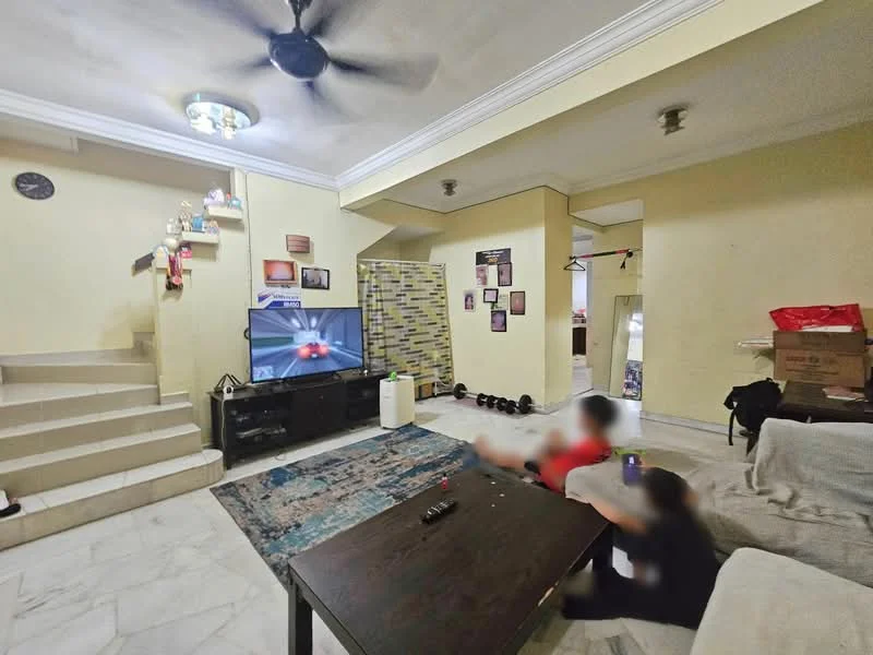 Living features: marble flooring, cream painted walls, ceiling fan, wall-mounted TV, black TV console, coffee table, area rug with geometric pattern, decorative wall with framed photos, staircase leading to upper level, open layout to adjacent rooms; style: traditional.