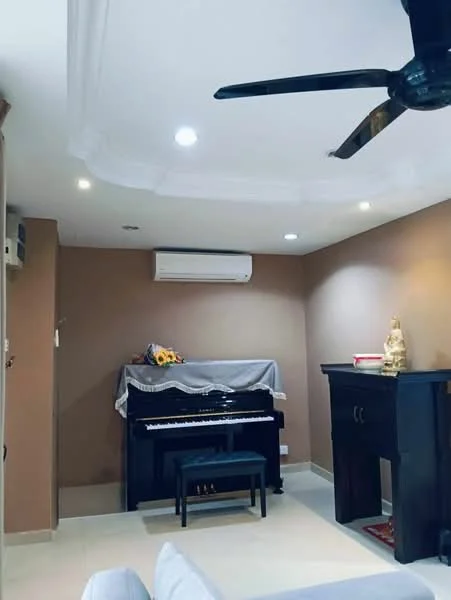 Living features: cream painted walls, tray ceiling, recessed downlights, 5-blade ceiling fan, wall-mounted split AC, black piano, black piano bench, wooden console table, decorative statue, small decorative items on console, tile flooring; style: modern.