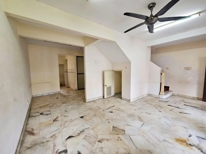 Living features: marble flooring, white painted walls, ceiling fan, staircase, door to adjacent room, natural light from windows, open layout, no visible furniture.