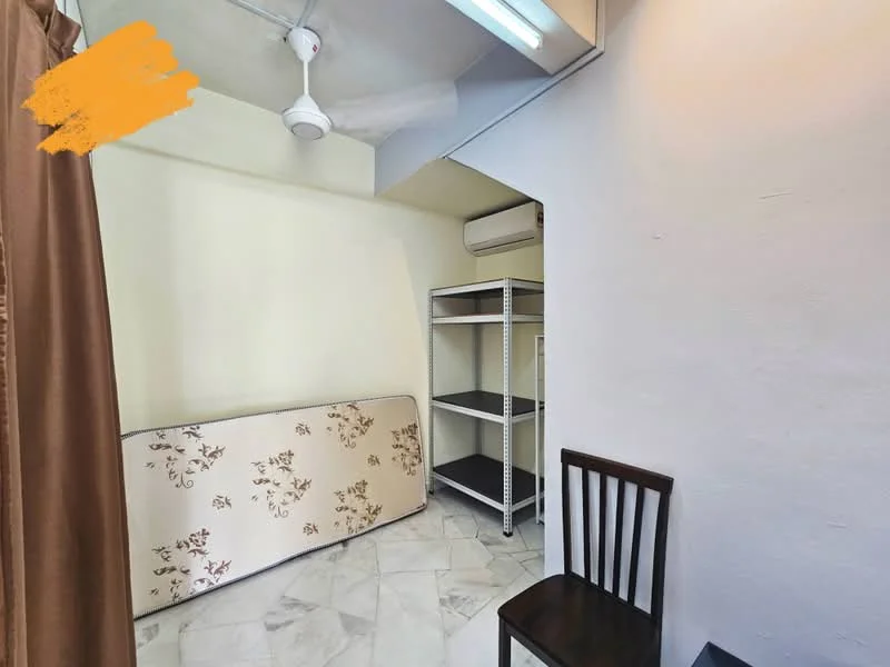 Room features: white painted walls, marble tile flooring, ceiling fan, wall-mounted air conditioning unit, metal shelving unit, wooden chair, foldable mattress, curtain, fluorescent ceiling lights.