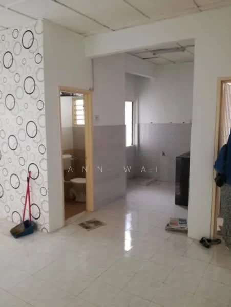 Room features: white tiled flooring, white painted walls, accent wall with circular pattern, window with natural light, doorway leading to bathroom, doorway leading to another room, exposed ceiling, clean and minimal decor; style: modern.