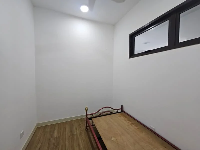 Bedroom features: white painted walls, wooden flooring, ceiling fan, window with black frame, unmade bed frame, light fixture on ceiling; style: modern.