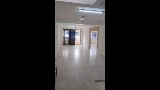 Room features: white painted walls, marble flooring, ceiling fan, sliding glass door, floor-to-ceiling windows, natural light, open layout, neutral color scheme; style: modern.