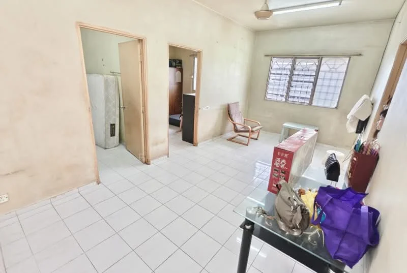Room features: white painted walls, tile flooring, ceiling fan, window with grid, glass-top table, wooden chair, various items on table, doorways leading to other rooms.