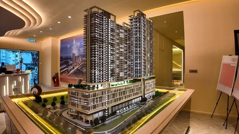 Exterior type: high-rise condominium; features: glass curtain wall, multiple balconies, landscaped podium garden, manicured lawn, surrounding trees, modern architectural design, illuminated signage, parking area, entrance lobby, water feature, outdoor seating area; style: modern.