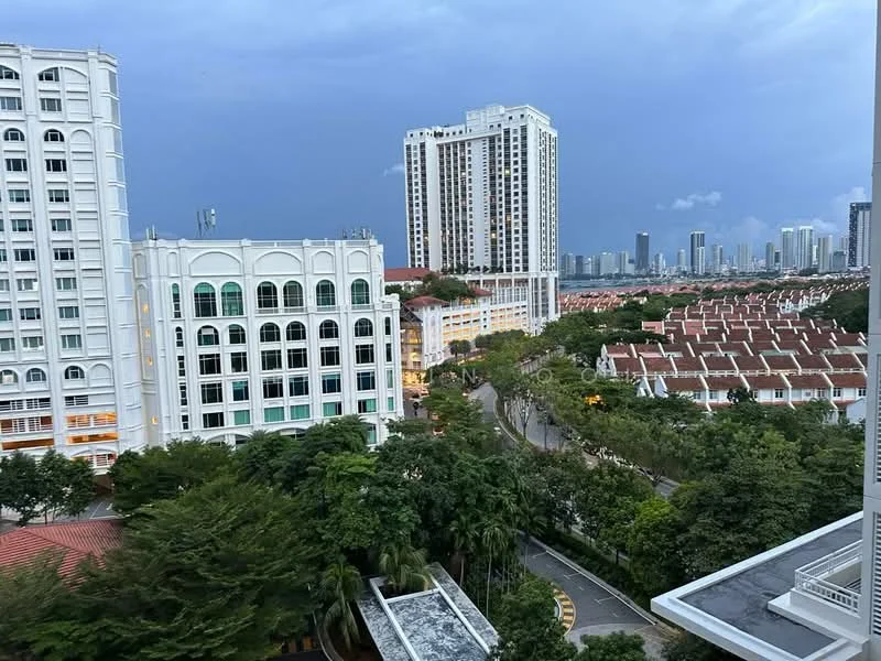 Exterior type: high-rise condominium; features: white painted facade, glass curtain wall, surrounded by mature greenery, urban skyline in background, multi-storey buildings, residential houses with red roofs, curved road, city view, night lighting visible; style: modern.