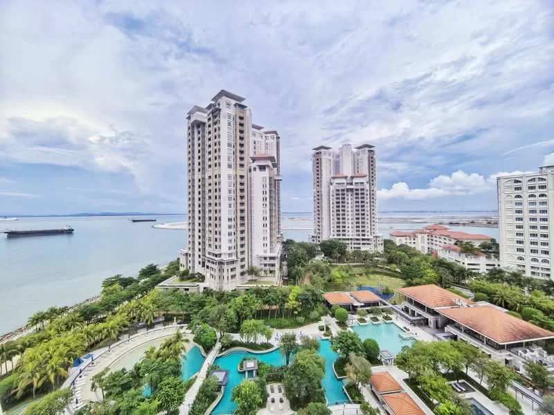 Exterior type: high-rise condominium; features: multiple high-rise buildings, waterfront view, landscaped gardens, swimming pools, palm trees, outdoor amenities, sea view, surrounding greenery; style: modern.