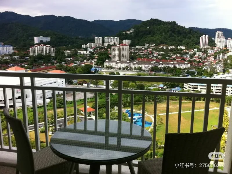 Balcony features: glass railing, round glass-top table, two wicker chairs, city view, mountain view, greenery view; style: modern; view: city.