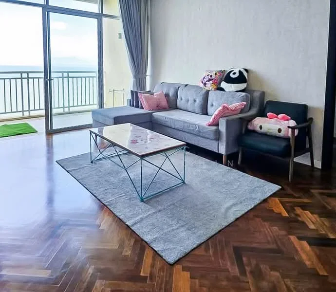 Living features: grey fabric 3-seater sofa, black armchair, glass coffee table with metal legs, area rug in grey, parquet wood flooring, floor-to-ceiling windows, curtains, decorative cushions, view of the sea, wall with light-colored finish; style: modern; view: sea.