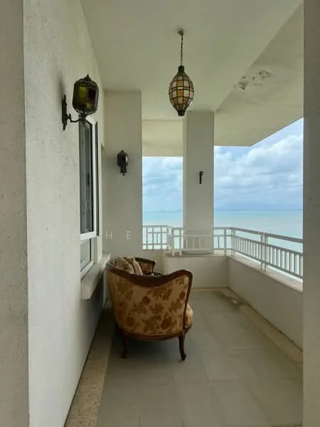 Balcony features: white painted walls, floor-to-ceiling windows, hanging lantern light fixture, decorative wall sconce, tiled flooring, outdoor seating area with upholstered chair, ocean view; style: modern; view: sea.