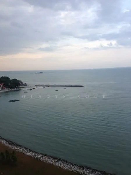 Exterior features: sea view, rocky shoreline, cloudy sky, calm water, distant islands, greenery along the coast.