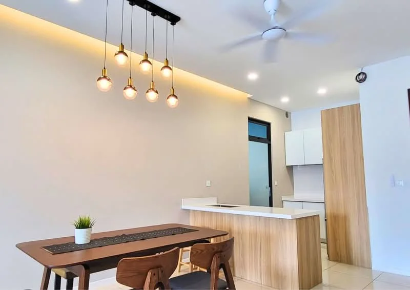 Dining features: wooden dining table, 4 wooden dining chairs, pendant lighting with multiple bulbs, recessed ceiling lights, white walls, cream tiled flooring, open kitchen layout, kitchen island with seating; style: modern. Kitchen features: white cabinetry, kitchen island, built-in appliances, countertop with overhang for seating; style: modern.