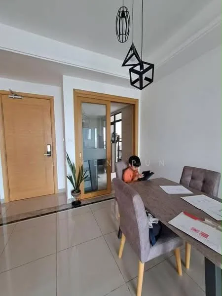 Dining features: grey upholstered dining chairs, wooden dining table, pendant light fixture, white walls, glossy tile flooring, decorative plant, framed glass door, documents on the table; style: modern. Room features: wooden door, glass panel door, white ceiling with crown moulding.