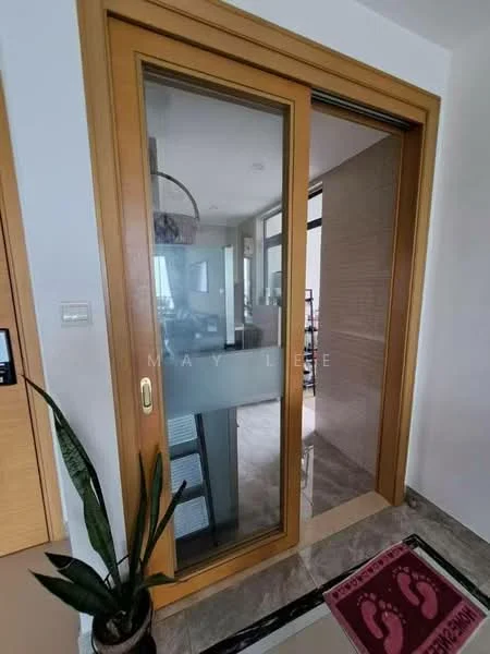 Room features: sliding glass door, wooden frame, transparent glass, tile flooring, decorative welcome mat, indoor plant, neutral wall color, visible hallway; style: modern.