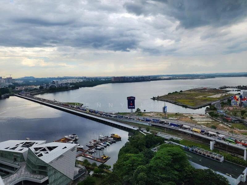Exterior features: city skyline view, waterfront, highway with traffic, green landscape, boats in the water, urban development area, cloudy sky; style: modern.