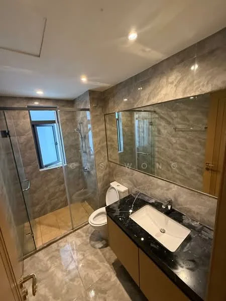 Bathroom features: marble tile flooring, grey marble wall cladding, glass shower enclosure, rain shower head, handheld shower, single-sink vanity with black marble top, chrome basin mixer, framed mirror, one-piece toilet, recessed downlights; style: modern.