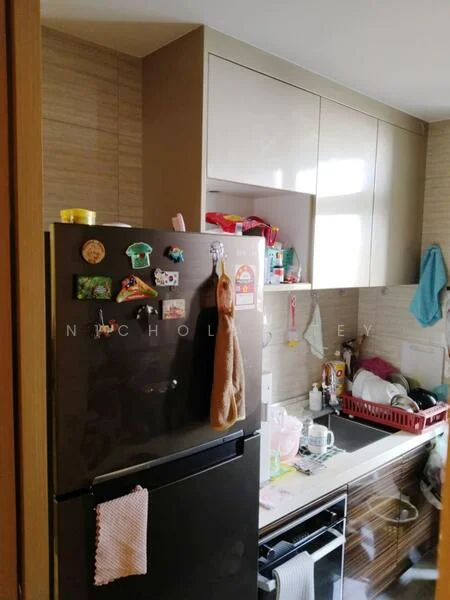Kitchen features: black fridge, built-in cabinetry with glossy finish, white countertop, stainless-steel range oven, sink with dish rack, wall-mounted shelves, various kitchen utensils, decorative magnets on fridge, light-colored wall tiles, window for natural light; style: modern.