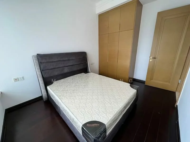 Bedroom features: queen-size bed, upholstered headboard, built-in wardrobe with wooden doors, wooden flooring, white painted walls, single window, door with wooden finish; style: modern.