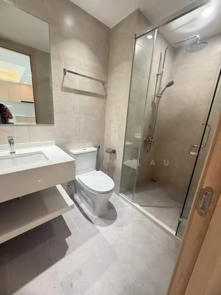 Bathroom features: single-sink vanity with white cabinet, chrome basin mixer faucet, framed mirror, one-piece toilet, walk-in shower with glass enclosure, rain shower head, tile cladding on walls, light grey tile flooring, towel rack, recessed downlights; style: modern.