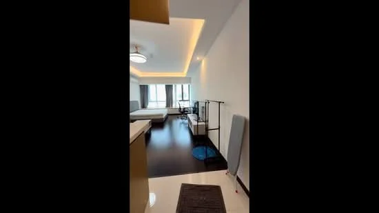 Room features: wooden flooring, white painted walls, recessed LED downlights, ceiling fan, floor-to-ceiling windows, curtains, open space layout, bed frame, clothes rack, area rug; style: modern; view: city.