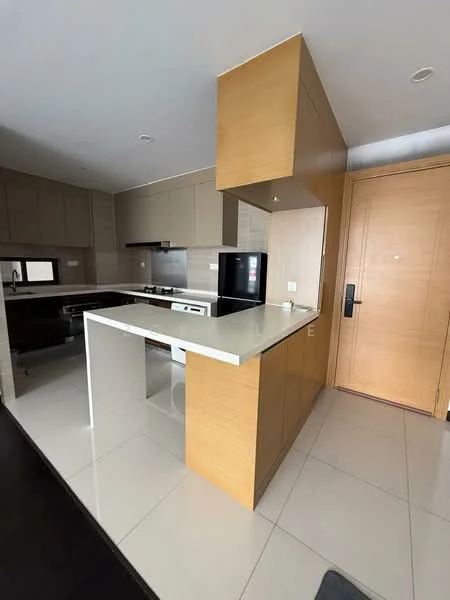 Kitchen features: light brown cabinetry, white countertop, built-in oven, stainless-steel fridge, black cooktop, ceramic tile flooring, grey backsplash, single-bowl stainless-steel sink, modern faucet, open layout, kitchen island, wall-mounted cabinets, recessed lighting; style: modern.