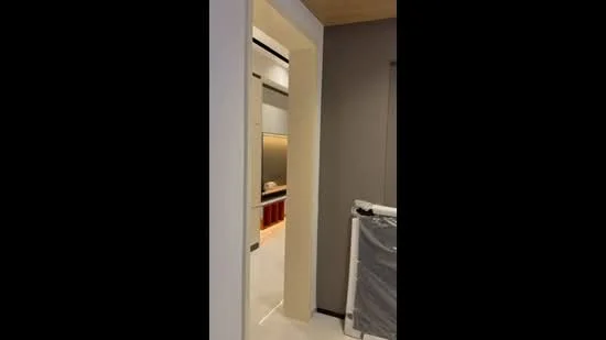 Room features: white painted walls, grey accent wall, light wood ceiling, glossy tile flooring, doorway with architrave, built-in cabinetry, recessed lighting; style: modern.