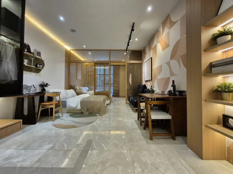 Room features: white painted walls, geometric patterned accent wall, marble tile flooring, recessed LED downlights, floor-to-ceiling windows, double bed with beige bedding, study desk with chair, dining table with chairs, open shelving unit, decorative plants, area rug with circular pattern; style: modern.