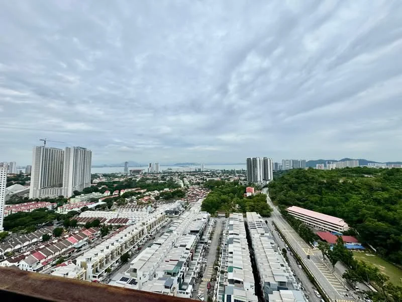 Exterior type: high-rise condominium; features: city skyline view, surrounded by greenery, multiple high-rise buildings, residential area with linked terrace houses, urban landscape, cloudy sky; style: modern.