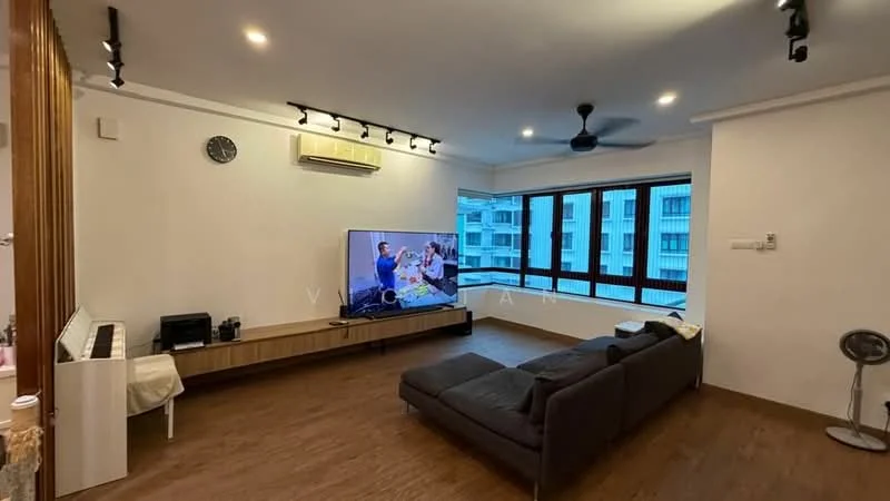 Living features: wooden flooring, white painted walls, recessed downlights, 5-blade ceiling fan, wall-mounted TV, TV console, sofa in dark grey, large windows with view, air conditioning unit, clock on wall, decorative wall paneling; style: modern.
