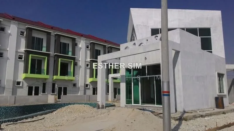 Exterior type: linked terrace house; features: white painted facade, flat roof, green accent balconies, large glass windows, exposed concrete, surrounding construction site, swimming pool area, manicured lawn, paved walkway; style: modern.