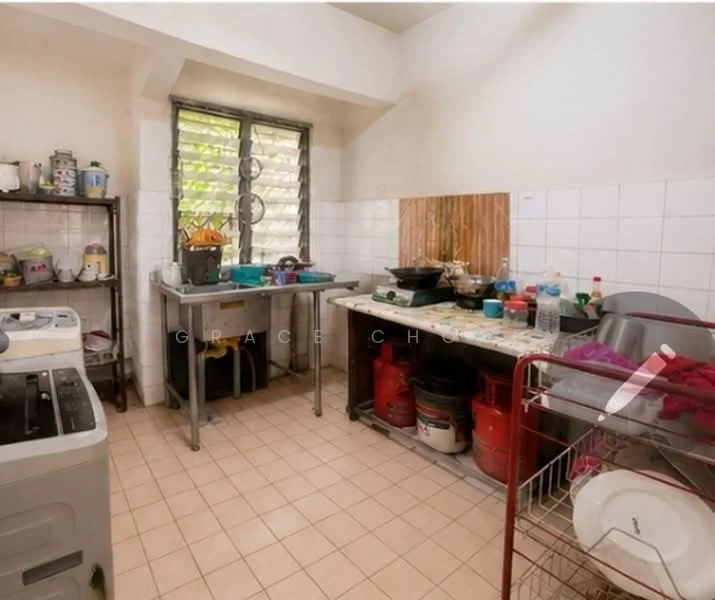 Kitchen features: stainless-steel sink, chrome faucet, tile backsplash, laminate countertop, wooden cabinets, open shelving, gas stove, washing machine, ceramic tile flooring, multiple containers and utensils, cluttered workspace.