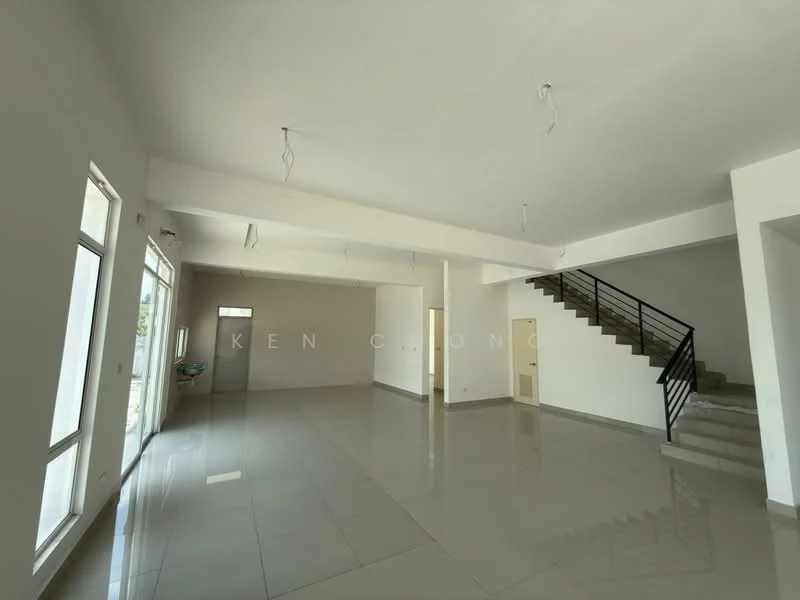 Room features: white painted walls, polished ceramic tile flooring, exposed ceiling with pendant light fixtures, large windows allowing natural light, staircase with metal railing, open layout, doorway leading to another room, no visible furniture; style: modern.