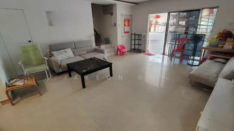 Living features: light beige tiled flooring, white painted walls, sofa in light grey fabric, black coffee table, wooden side table, floor-to-ceiling windows with sheer curtains, sliding glass door, decorative wall with a red poster, open layout, area rug, plastic chair, storage unit, dining table with chairs; style: modern.