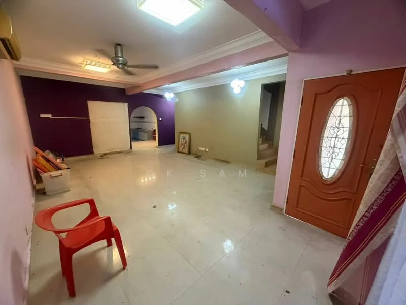 Room features: white tiled flooring, purple painted walls, ceiling fan, recessed ceiling lights, arched doorway, wooden front door with glass panel, red plastic chair, staircase visible in background, wall-mounted air conditioning unit, light fixtures, empty space, no visible furniture.