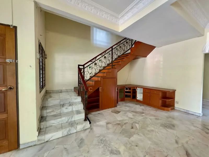 Room features: marble flooring, wooden staircase with decorative railing, cream painted walls, built-in wooden cabinetry, large window for natural light, crown moulding on ceiling, open layout, no visible furniture; style: modern.