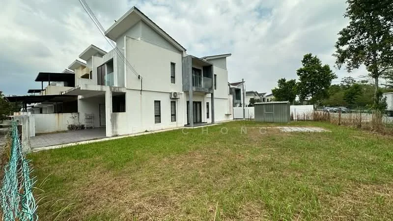 Exterior type: semi-detached house; features: white painted facade, flat roof, two-storey structure, manicured lawn, concrete pathway, fenced perimeter, air conditioning units visible, outdoor storage shed, surrounded by greenery, parking space visible; style: modern.