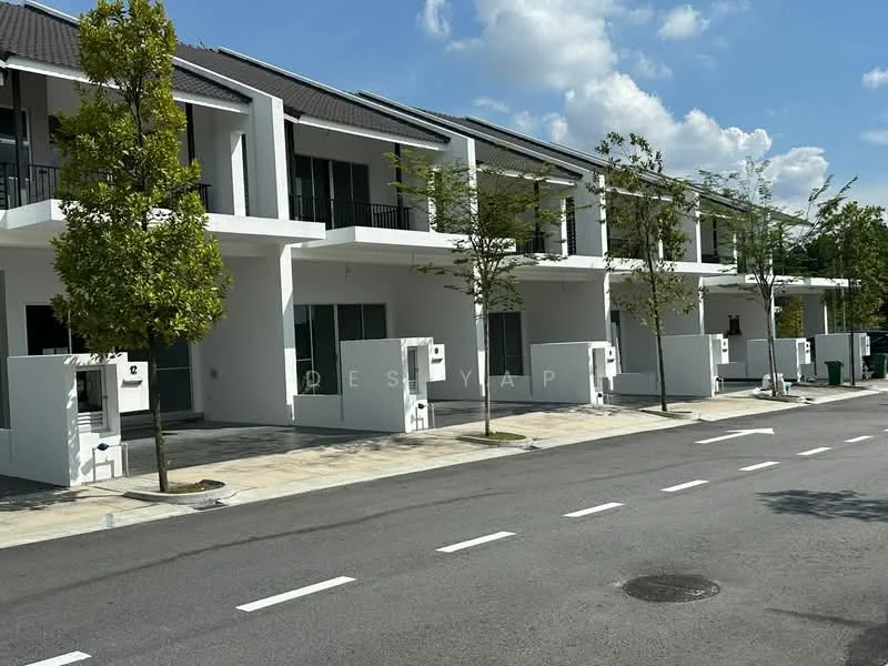 Exterior type: linked terrace house; features: white painted facade, flat roof, two-storey, manicured lawn, paved walkway, trees planted along the street, driveway with interlocking pavers, multiple front entrances, large windows, balconies on upper level; style: modern.