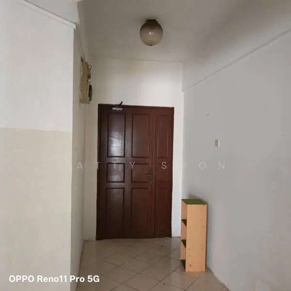 Room features: white painted walls, cream tiled flooring, wooden door with multiple panels, ceiling light fixture, small wooden cabinet, air conditioning unit, corner space, neutral color scheme; style: minimalist.