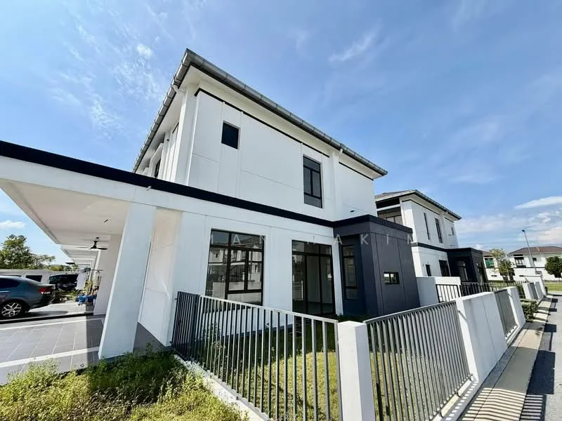 Exterior type: semi-detached house; features: white painted facade, black accent wall, flat roof, approximately 2-storey, manicured lawn, paved walkway, fenced perimeter, large windows, car porch, driveway, surrounded by greenery; style: modern.