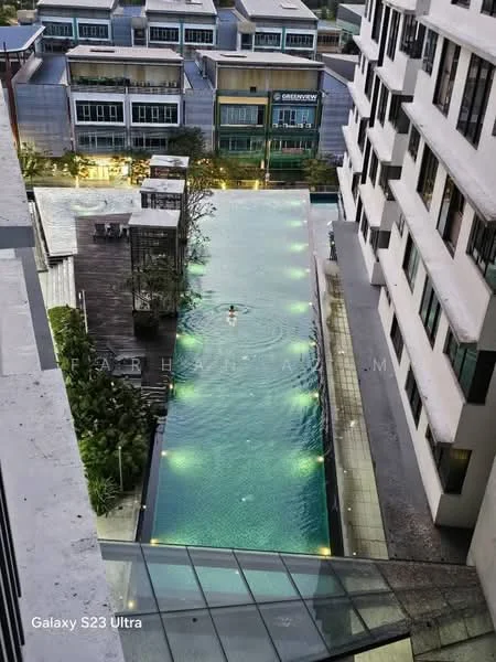 Exterior type: high-rise condominium; features: infinity pool, pool deck with loungers, landscaped garden, surrounding residential buildings, outdoor lighting, water feature, glass railing, modern architecture; style: modern.