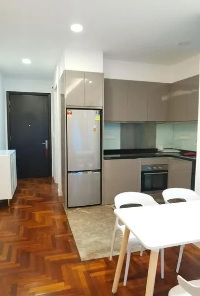 Kitchen features: grey cabinetry, black countertop, stainless-steel fridge, built-in oven, ceramic cooktop, white dining table, white chairs, wooden flooring, wall-mounted cabinets, glass splashback, recessed lighting; style: modern. Room features: main entrance door, open layout.