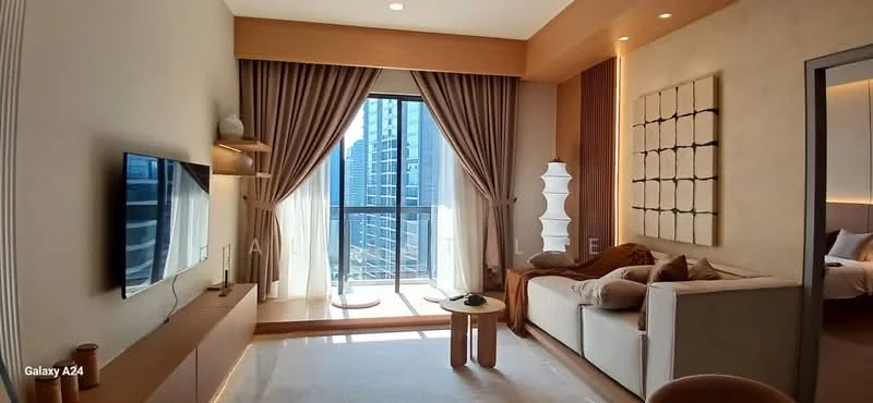Living features: floor-to-ceiling windows, curtains, wall-mounted TV, light wood media console, cream upholstered sofa, decorative throw pillows, coffee table, area rug, decorative wall art, lampshade floor lamp, neutral wall colour, recessed lighting, carpeted flooring; style: modern; view: city.