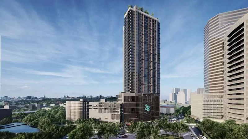 Exterior type: high-rise condominium; features: glass curtain wall, greenery on rooftop, multiple balconies, modern facade with dark cladding, surrounded by landscaped greenery, urban context with city skyline in background; style: modern.