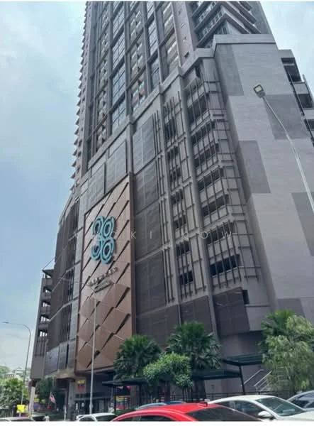 Exterior type: high-rise condominium; features: glass curtain wall, exposed concrete facade, projecting balconies, feature lighting at night, approximately 20-storey high-rise, manicured landscaping, entrance with awning, surrounded by mature greenery; style: modern.