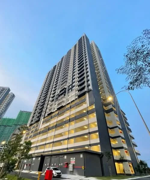 Exterior type: high-rise condominium; features: glass curtain wall, grey painted facade, balconies on upper floors, multiple storeys, parking deck visible, street lighting, surrounded by greenery; style: modern.